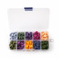 Mixed-color four-hole resin buttons in open storage case with small divided trays