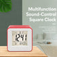 Red square desktop alarm clock with large digital numbers on its screen