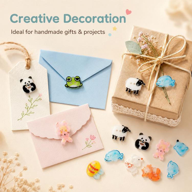 Colorful animal-shaped resin buttons scattered near handmade cards and gifts, including panda and sheep