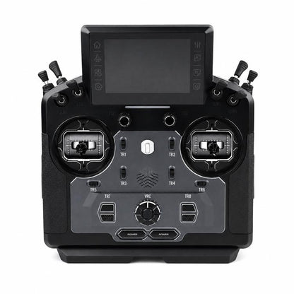 RC radio transmitter with dual control gimbals and dark LCD screen on front panel