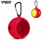 Red silicone park golf ball protective cover with carabiner clip and loop.