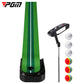 Green putting practice mat with black base, training putter and three practice balls