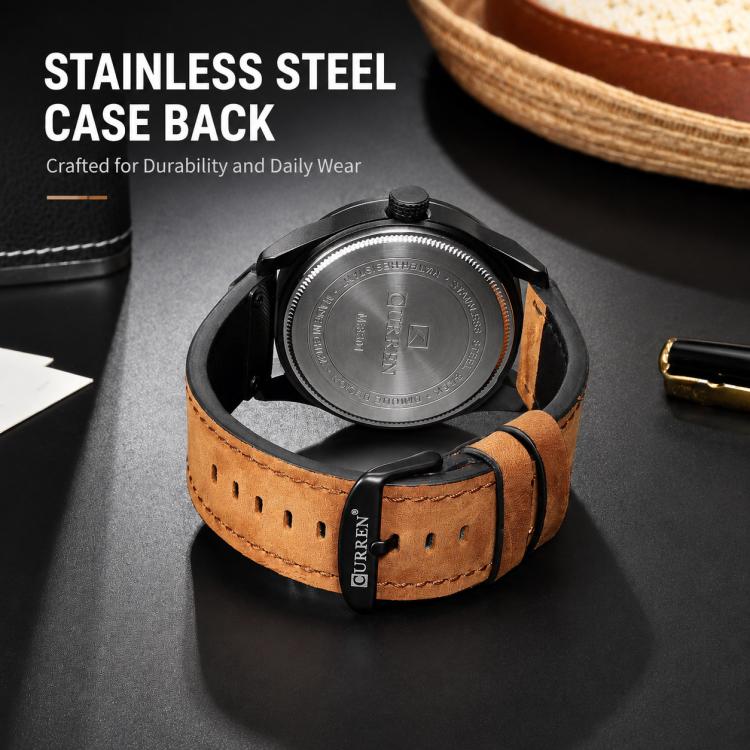 Men's leather analog watch with stainless steel case back, brown strap and buckle
