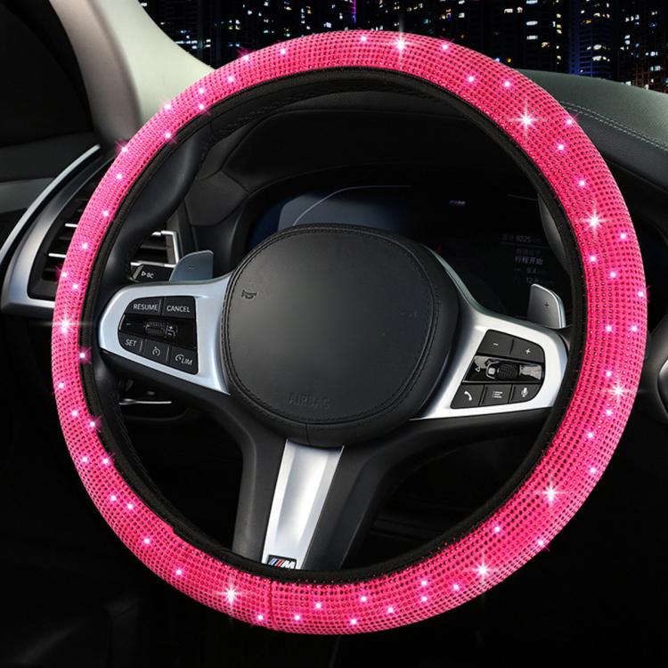 Pink diamond-studded steering wheel cover with sparkling trim