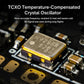 TCXO temperature-compensated crystal oscillator chip close-up on receiver PCB