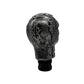 Black skull-style manual gear shift knob with textured face design