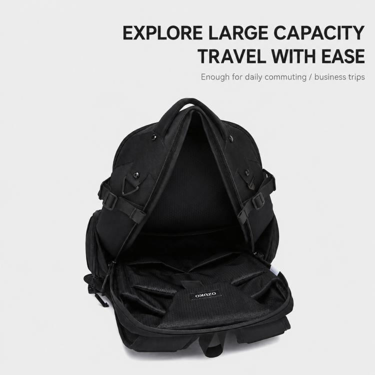 Black laptop backpack laid open with adjustable straps and front storage pockets