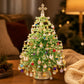 Beaded Christmas tree ornament with multicolor hanging beads and warm white lights