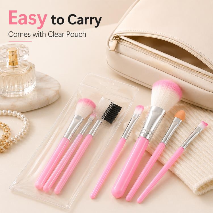 Pink makeup brush set with clear pouch and five brushes with silver handles