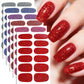 Red glitter nail sticker set with oval decals, shown on manicured fingernails.