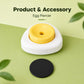 Yellow egg piercer on white base with black magnetic plate