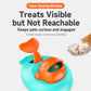 Whale-shaped treat-launch toy with orange opening and teal body, shown near paw