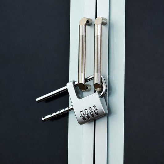 Telescopic combination lock with 4-digit keypad and adjustable shackle, mounted on a cabinet handle