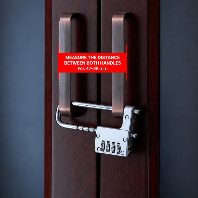 Combination lock with adjustable shackle fitted across two cabinet handles, secured on dark wood