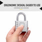 All-metal combination padlock with silver body and short shackle, held in hand