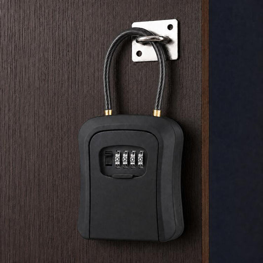 Wall-mounted key lock box with steel cable, black front combination dial cover.
