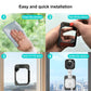 WiFi security camera with white base and black body on a window mount