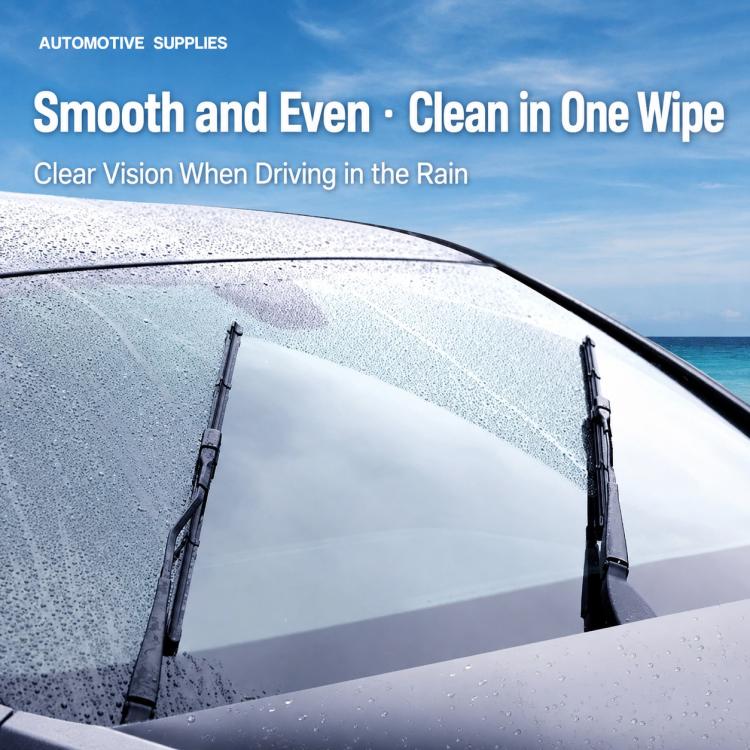 Windshield wiper blades with water droplets on glass