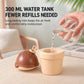 Ice-cream humidifier with brown lid and cup tank as water pours in