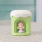 Green mini night light humidifier with angel figurine in front window