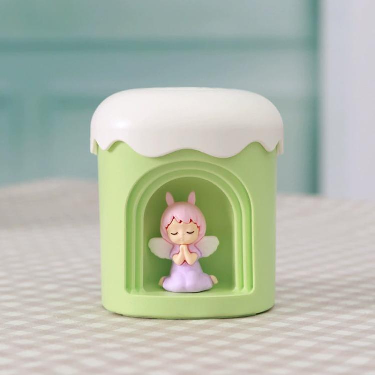 Green mini night light humidifier with angel figurine in front window