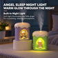 Purple and green mini desktop night light humidifier with glowing angel display and mist
