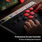 Arcade-style controller with red buttons, black sticks, and hand-held gaming controls