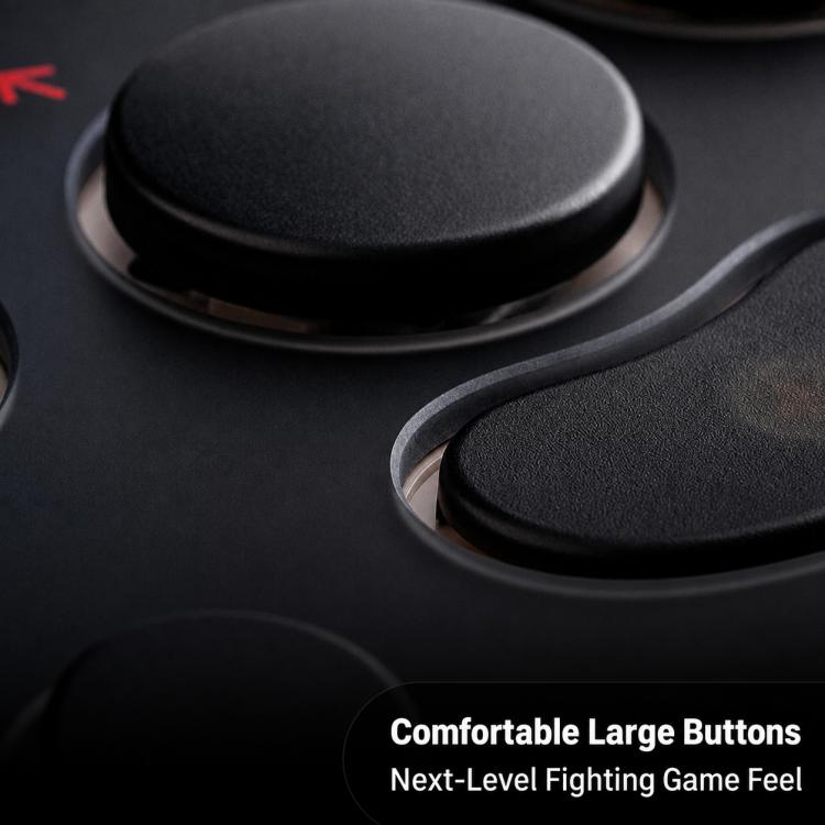 Arcade controller detail showing two large black buttons with soft textured caps