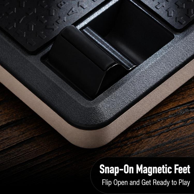 Arcade controller corner detail showing snap-on magnetic feet and textured black rubber base