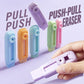 Refillable sliding macaron-style eraser, purple model in hand with teal and pink versions.