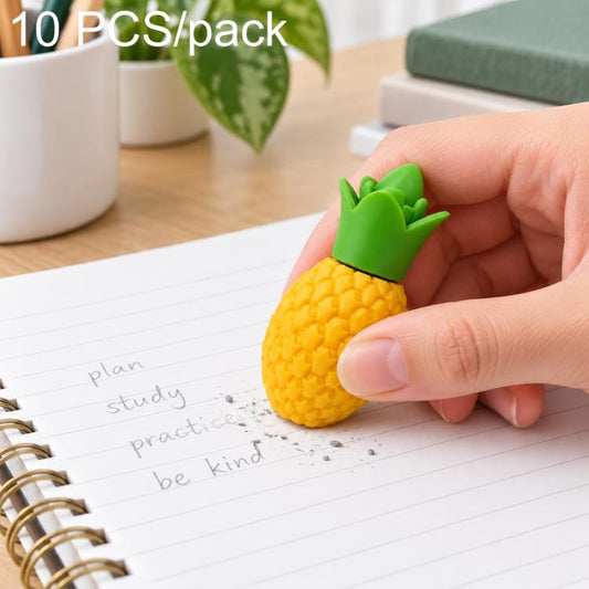 Jumbo pineapple-shaped cartoon eraser, yellow with green top, held in hand