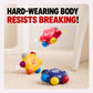 Flower-shaped pocket crayons on the floor with “hard-wearing body” text above