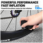 Hand using compact electric inflator nozzle on bicycle tire valve.