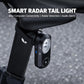 Cycling radar tail light mounted on bike seatpost, with lens and side buttons