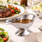 Stainless steel gravy boat with spout and loop handle, filled with brown sauce