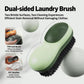 Green double-sided laundry brush with textured pad and dark bristle cleaning surface