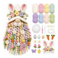 Crochet bunny-eared door hanger with pastel flowers and striped carrot accents, craft kit