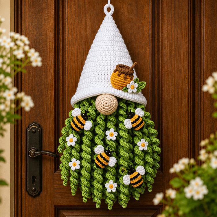 White and green crochet honeybee door hanger with bee appliques and small flowers