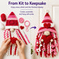 Red and white 3D crocheted door hanger with heart accents and striped skirt