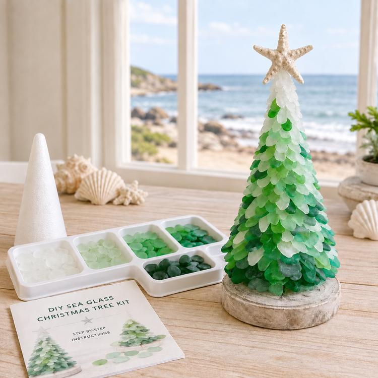 DIY sea glass Christmas tree craft with green layered tree, star topper, and kit pieces