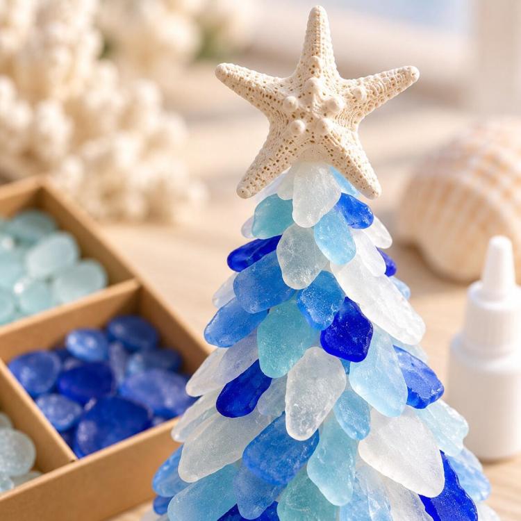 Close-up DIY sea glass Christmas tree craft with star topper and blue layered tiers