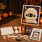 Halloween 3D fabric weaving quilt kit with mummy wrapped face design on canvas easel