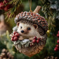 Hedgehog Christmas ornament with pine needles, red berry clusters, and a gold hanging loop