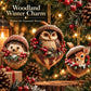 Woodland animal Christmas ornaments hanging: hedgehog, owl, and deer with berry garlands