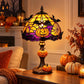 Halloween stained glass table lamp with purple shade featuring jack-o'-lantern, skeleton base.