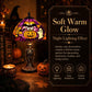 Halloween stained glass table lamp with purple shade showing jack-o'-lantern, ghost, skeleton base.