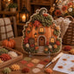 3D textile art pumpkin cottage with wreath-like flowers and arched door