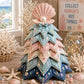 Patchwork Christmas tree ornament with pink scallop shell topper and layered ocean fabric