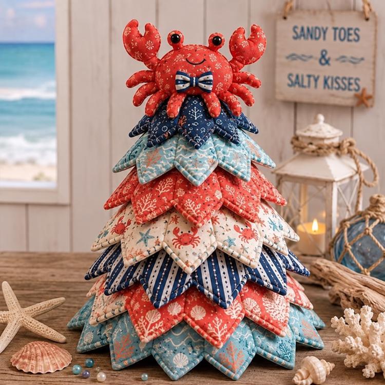 Patchwork Christmas tree ornament with red crab topper and layered ocean fabric panels