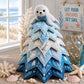 Patchwork Christmas tree ornament with white seal topper and layered blue ocean fabric